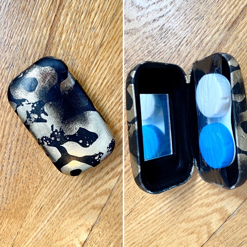 Adorable black and gold animal print contact case